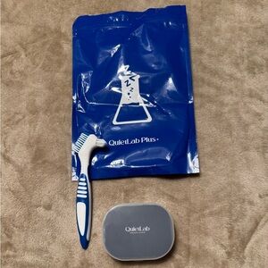 Snoring mouthpiece with brush.  Blue and White.